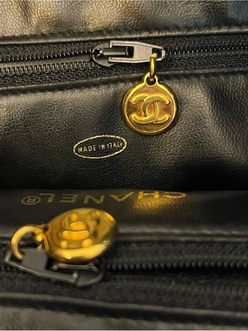 CHANEL Black Quilted Leather Backpack with Gold CC Accent